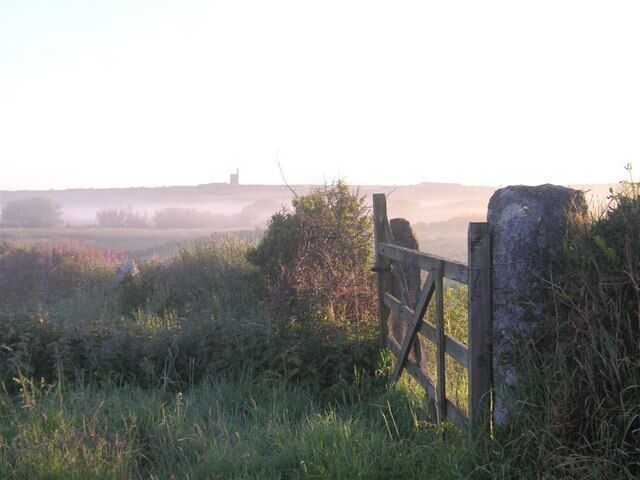 Ding Dong at sunrise The Greenburrow stack of the Ding Dong mine on the horizon, at sunrise on a June morning.
