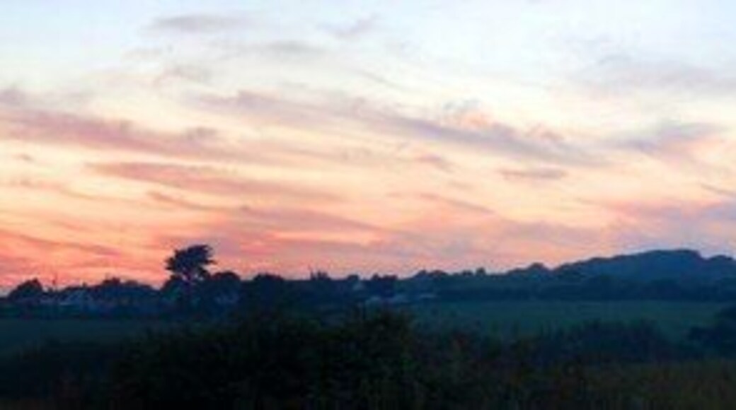 Sunset over Rosudgeon I took this photo whilst out walking my dogs towards from Kenneggy towards Rosudgeon Common, down the back lane. Minutes later the orange glow had changed to a pale blue hue, but it was captured forever for all to see !