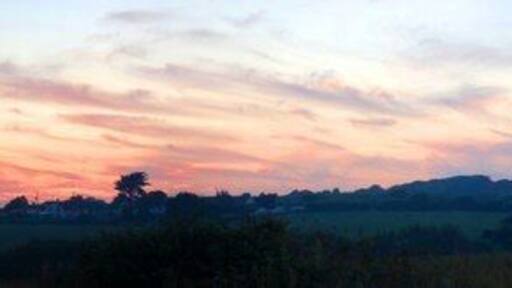 Sunset over Rosudgeon I took this photo whilst out walking my dogs towards from Kenneggy towards Rosudgeon Common, down the back lane. Minutes later the orange glow had changed to a pale blue hue, but it was captured forever for all to see !