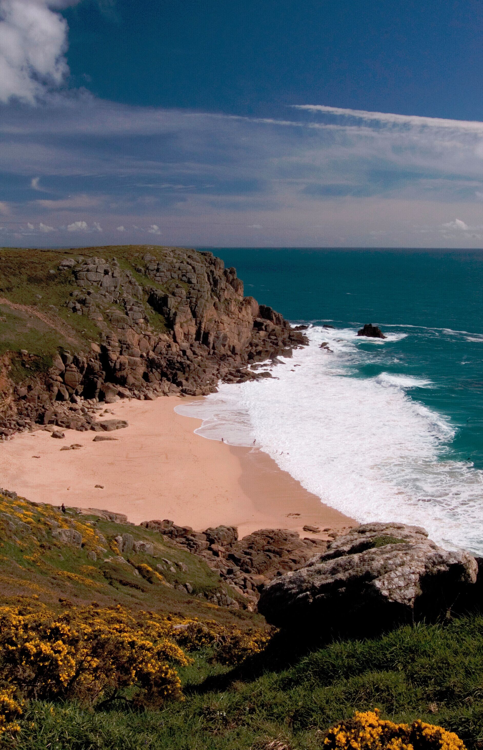 The beautiful but difficult to climb down to beach at Porthchapel has now (May 2018) been sadly been swept clean of all the sand in this image by the winter storms, leaving only rocks. From this photo I estimate that a depth of 3 metres of sand has been washed away.
