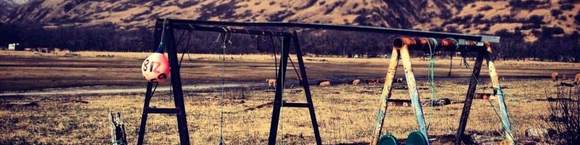 A child's play set with fishing buoys at Kalsin Beach