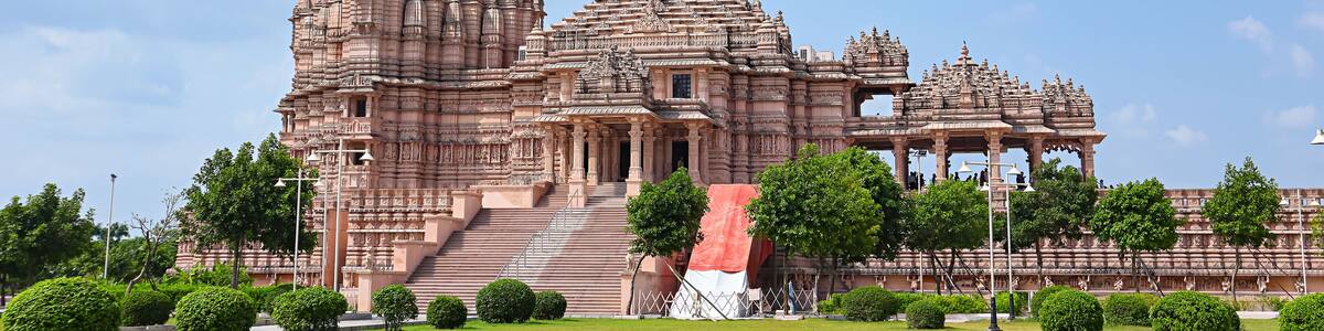 View of the newly built Shree Khondaldham Temple with carved sculptures of Hindu deities, Kagvad, Rajkot, Gujarat, India.