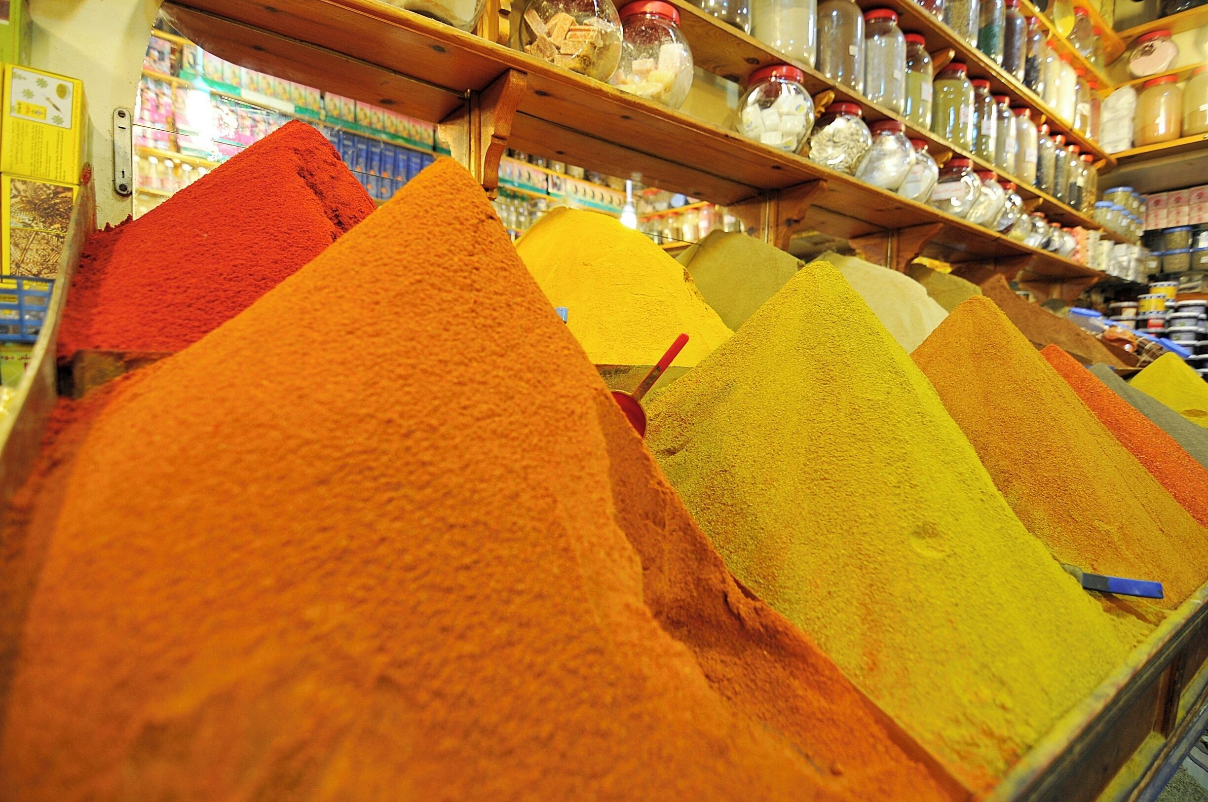You see mounds of spices, I see heaven! 
You can find freshly ground spices all over Morocco, but this particular photo was taken in a market located inside the medina in Marrakech, Morocco. 
While you're there, grab some fresh oranges and sprinkle them with a mixture of salt, cayenne, cumin, and turmeric. You're welcome! 

#Market #contest #spices #food