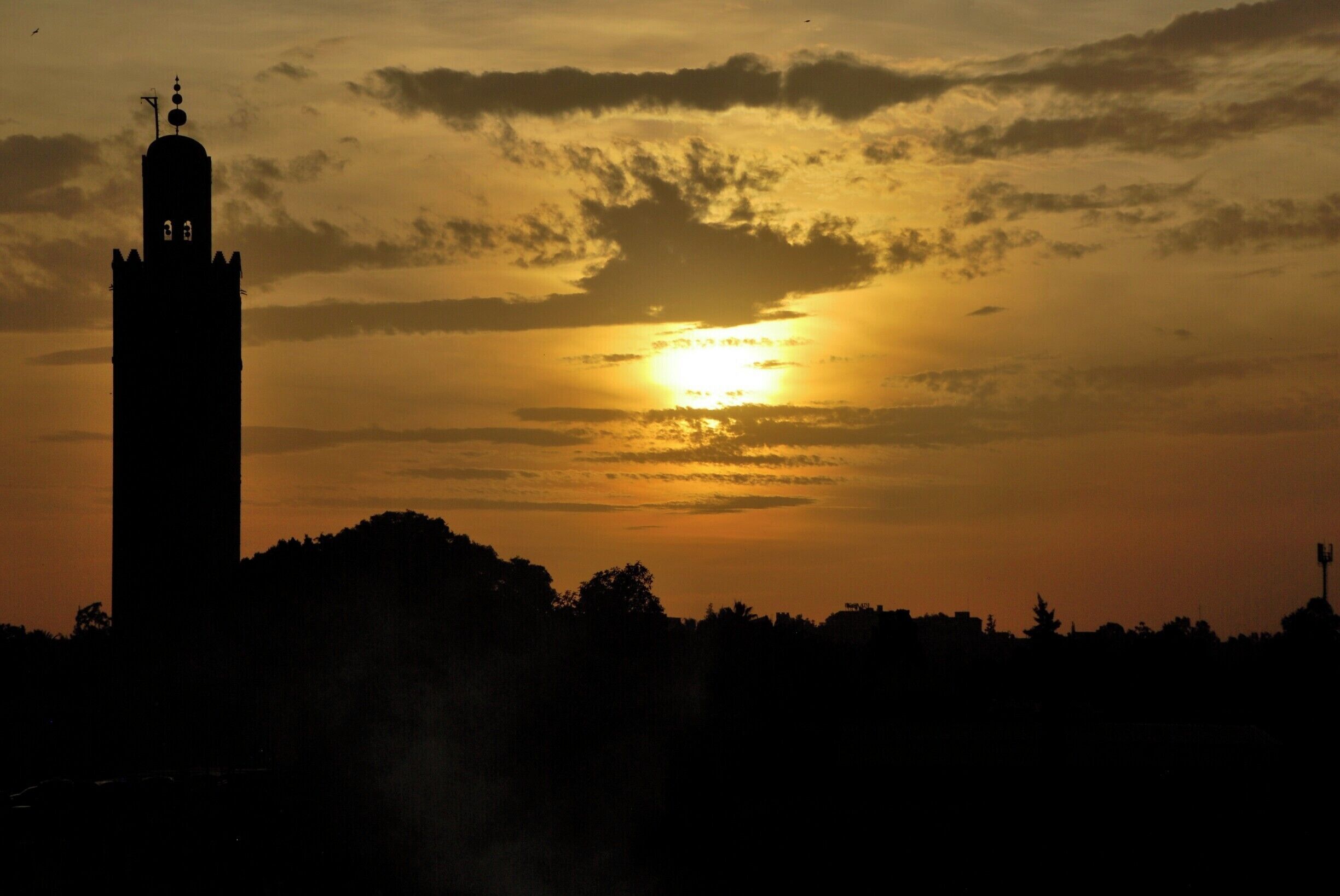 Marrakech is a major city in the northwest African nation of Morocco. It is the fourth largest city in the country after Casablanca, Rabat and Fes, and is the capital of the mid-southwestern region of Marrakesh-Tensift-El Haouz.  Marrakesh is possibly the most important of Morocco's four former imperial cities (cities that were built by Moroccan Berber empires). The red walls of the city have given the city the nickname of the "Red City". Marrakesh grew rapidly and established itself as a cultural, religious, and trading centre for the Maghreb and sub-Saharan Africa; Jemaa el-Fnaa is the busiest square in Africa.