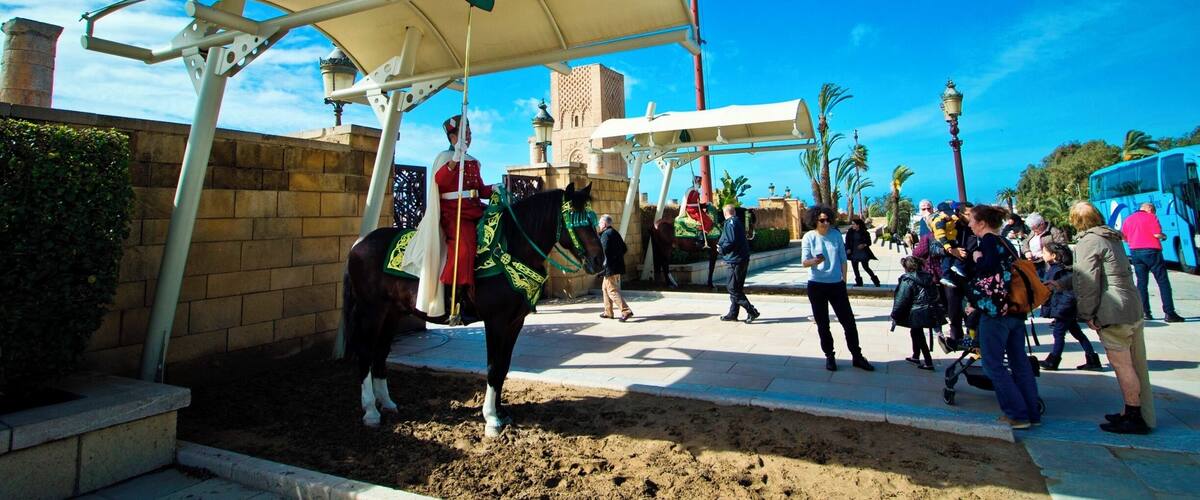 Royal guards on horses at the entrance of Hassan Tower, here tourist are allowed to take pictures of the guards on most places it is forbidden to take pictures of policeman, palace guard and military personnels.