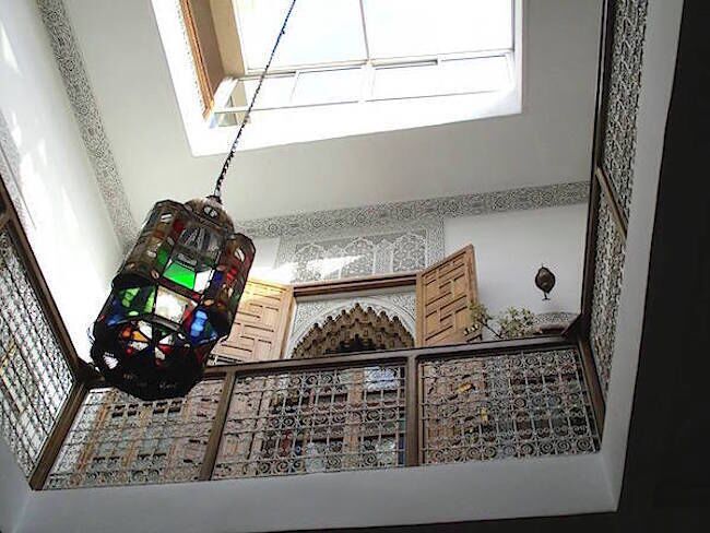 I think I took more photos of this riad than any other on this trip.  This shot is from the courtyard, looking up at the third floor and the intricacies of the carved plasterwork, the carved bannister, and the lantern suspended from the glassed in ceiling.

I could have spent the entire day here.

https://davenotravels.blog