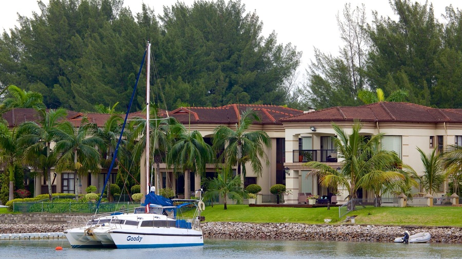 Richards Bay featuring a bay or harbor and a house