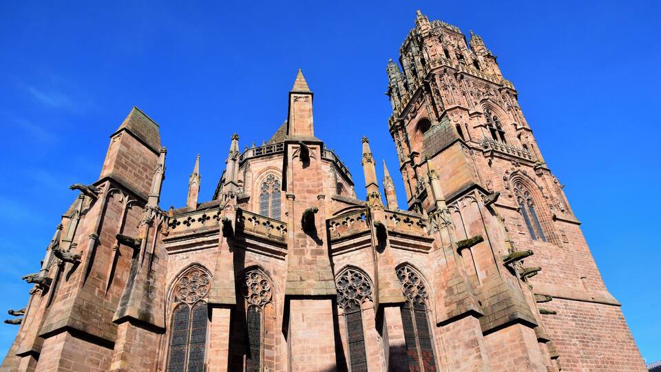 A Gothic cathedral with intricate stonework and pointed arches.