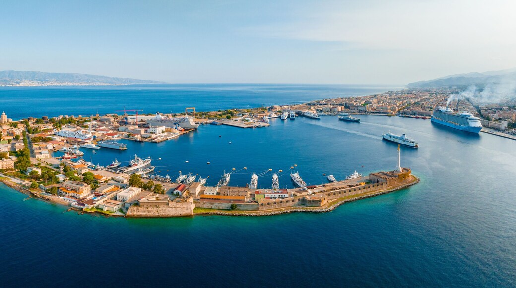 Messina, Sicily, Italy, August 20, 2022. View of the Messina's port with the gold Madonna della Lettera statue