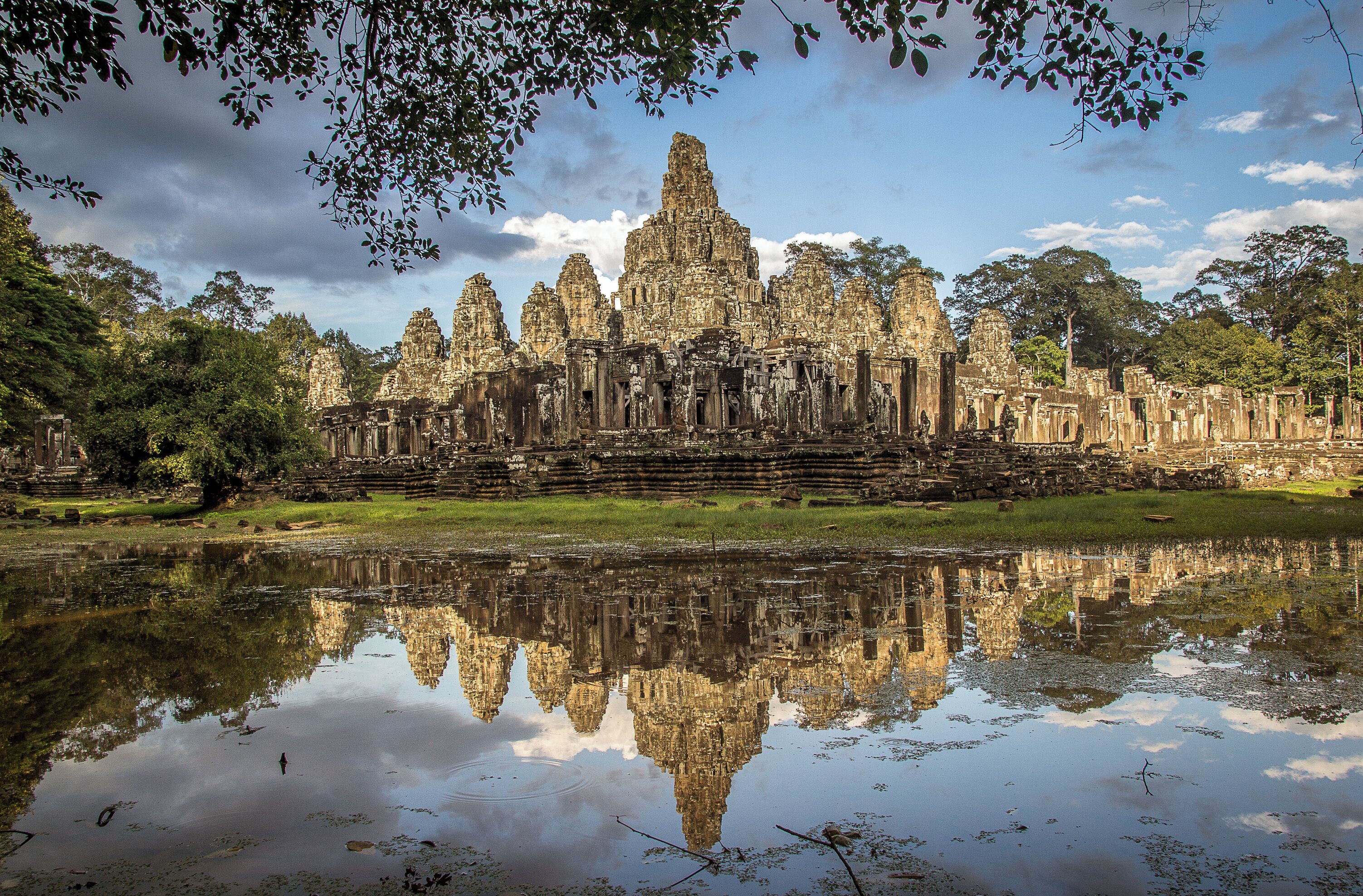 Wandering around the outside of Bayon temple after some rain I saw this pool of water creating a perfect reflection of the temple. #ancient #architecture #history