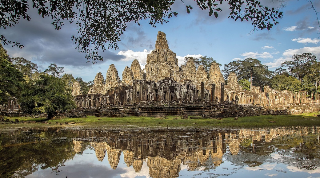 Wandering around the outside of Bayon temple after some rain I saw this pool of water creating a perfect reflection of the temple. #ancient #architecture #history