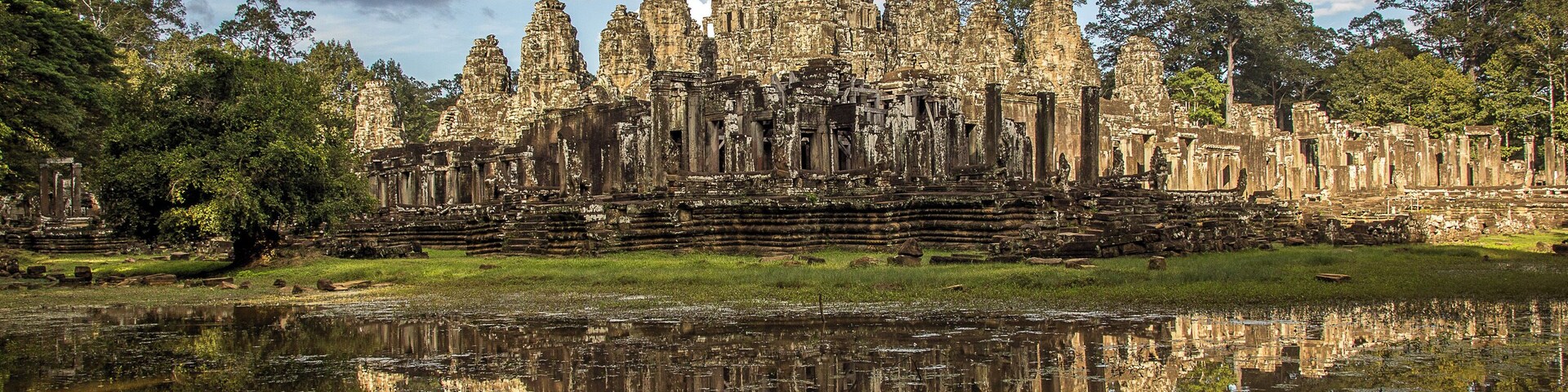 Wandering around the outside of Bayon temple after some rain I saw this pool of water creating a perfect reflection of the temple. #ancient #architecture #history