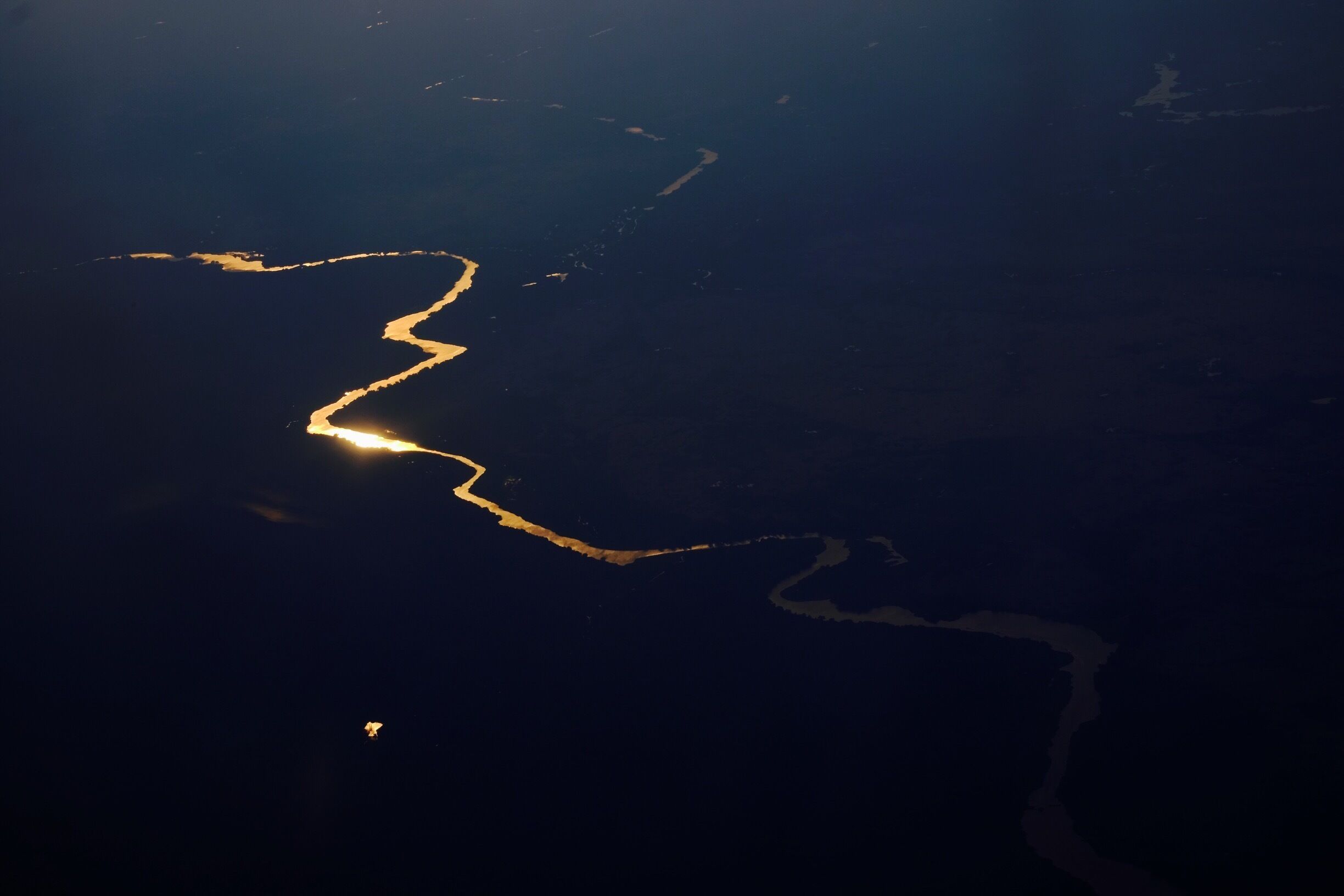 Siem Reap River at Combodia is one of the most beautiful place to visit. Photo is taken in the flight as you approach Siem Reap airport.