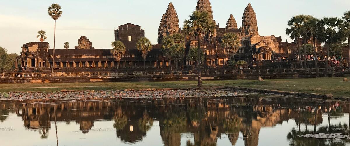 Beautiful sunset in Angkor Wat 😲. Angkor Wat or "Capital Temple" is a temple complex in Cambodia and the largest religious monument in the world, on a site measuring 162.6 hectares. It was originally constructed as a Hindu temple of god Vishnu for the Khmer Empire, gradually transforming into a Buddhist temple towards the end of the 12th century. It was built by the Khmer King Suryavarman II in the early 12th century in Yaśodharapura the capital of the Khmer Empire, as his state temple and eventual mausoleum.