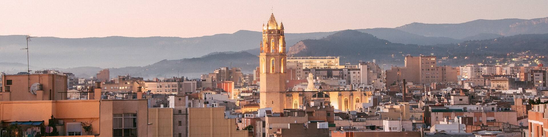 Bell tower of the church of Reus, Prioral de Sant Pere, city of Catalonia, Spain at day