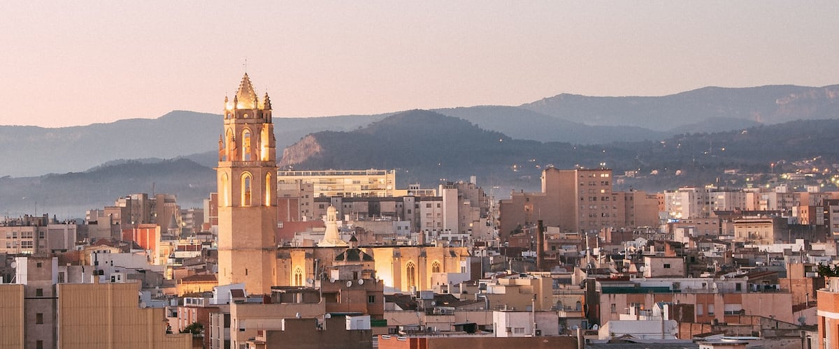 Bell tower of the church of Reus, Prioral de Sant Pere, city of Catalonia, Spain at day