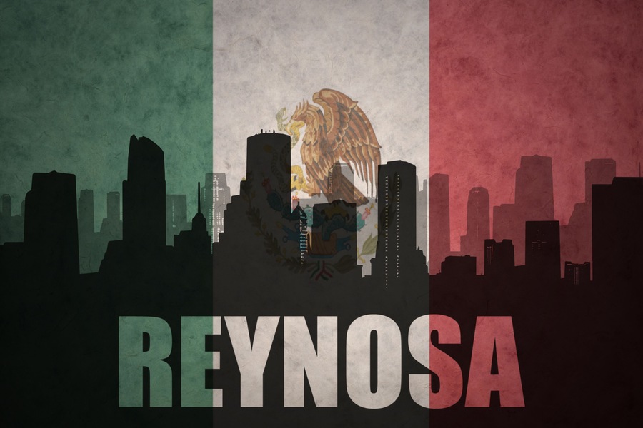 abstract silhouette of the city with text Reynosa at the vintage mexican flag