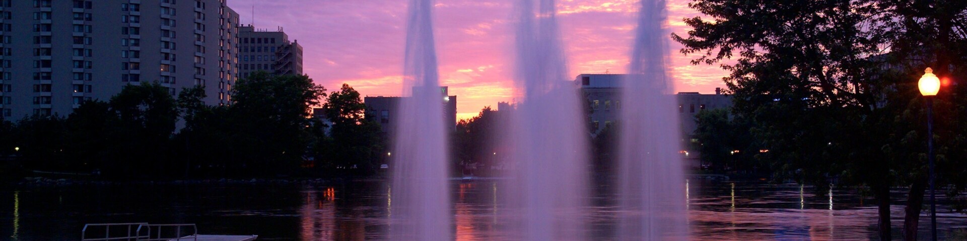 Rockford showing a fountain and a sunset