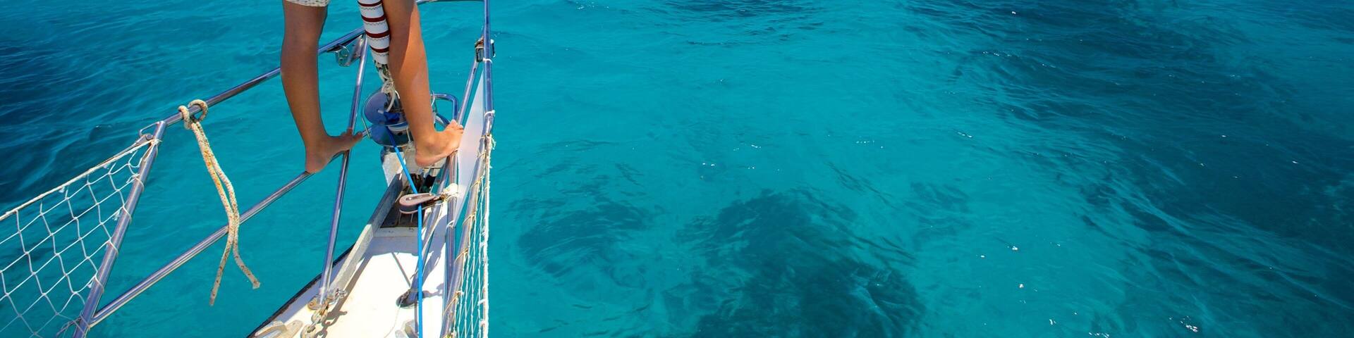 Tahiti which includes boating and general coastal views as well as an individual femail