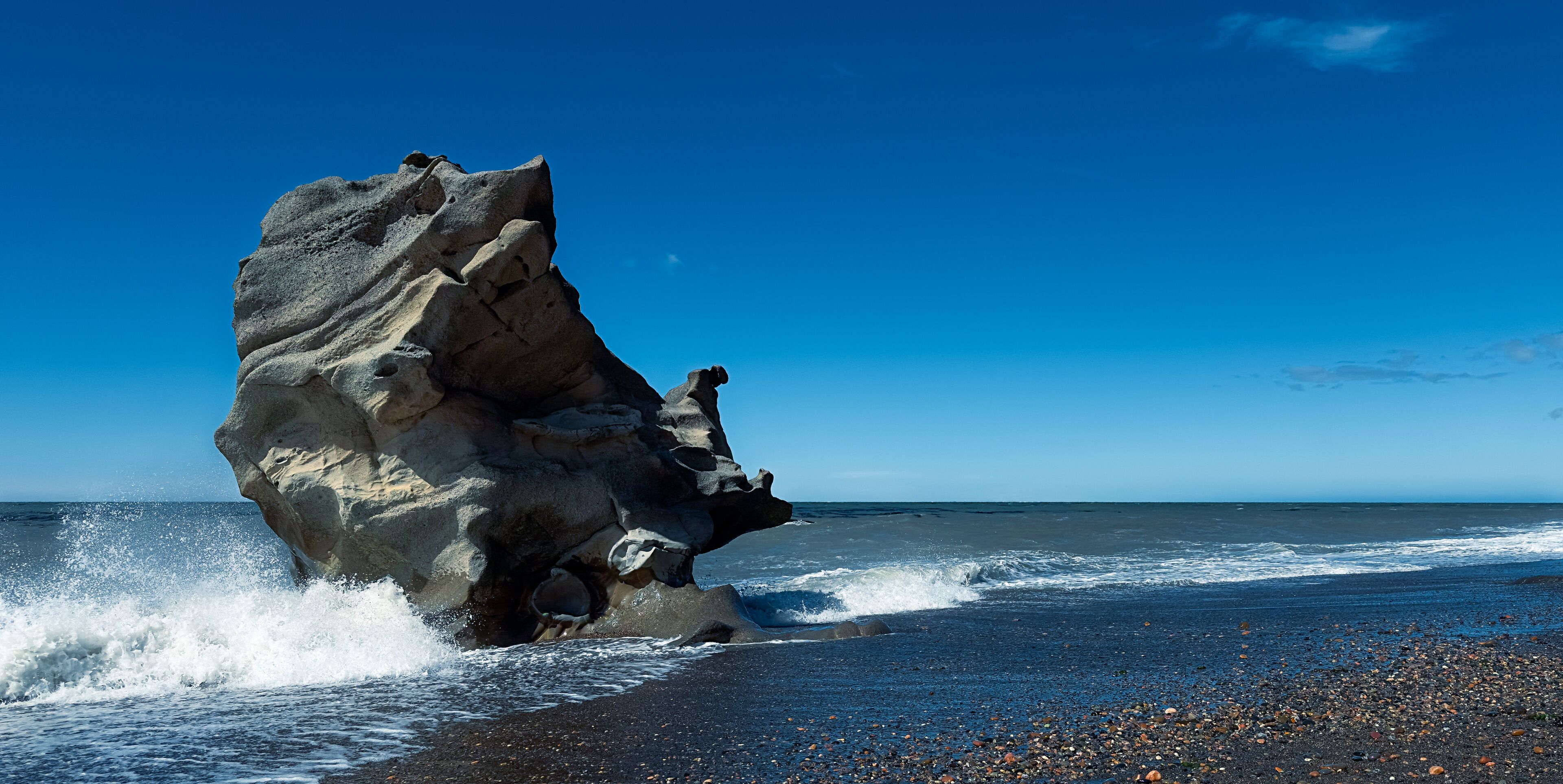 Rock formation in the Atlantic ocean. Rio Grande, Patagonia Argentina