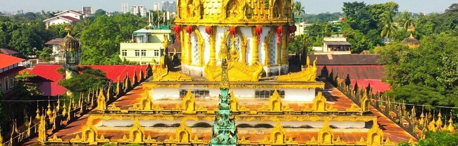 The pagoda with a lot of artwork in the monastery compound , views from the top floor of tower .