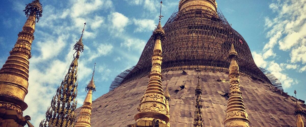 The Shwedagon Pagoda, officially named Shwedagon Zedi Daw and also known as the Great Dagon Pagoda and the Golden Pagoda, is a gilded stupa located in Yangon, Myanmar. This most revered symbol of Buddhism in Myanmar can best be visited in the late afternoon and up to its closing time of 9pm where it is illuminated by spot lights and heightens its majestic appearance. #architecture