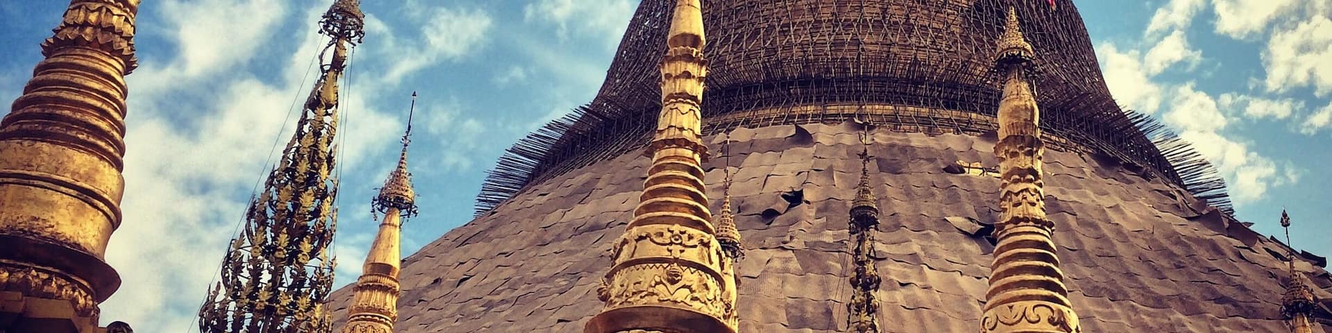 The Shwedagon Pagoda, officially named Shwedagon Zedi Daw and also known as the Great Dagon Pagoda and the Golden Pagoda, is a gilded stupa located in Yangon, Myanmar. This most revered symbol of Buddhism in Myanmar can best be visited in the late afternoon and up to its closing time of 9pm where it is illuminated by spot lights and heightens its majestic appearance. #architecture