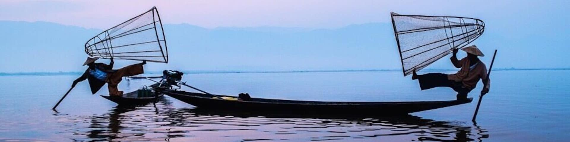 Inle Lake is one of the most beautiful and famous destinations in Myanmar, former Burma. 2 fishermen pose for the photo at sunrise in the middle of the Lake.
#myanmar #blue #southeastasia #inlelake #bestof5