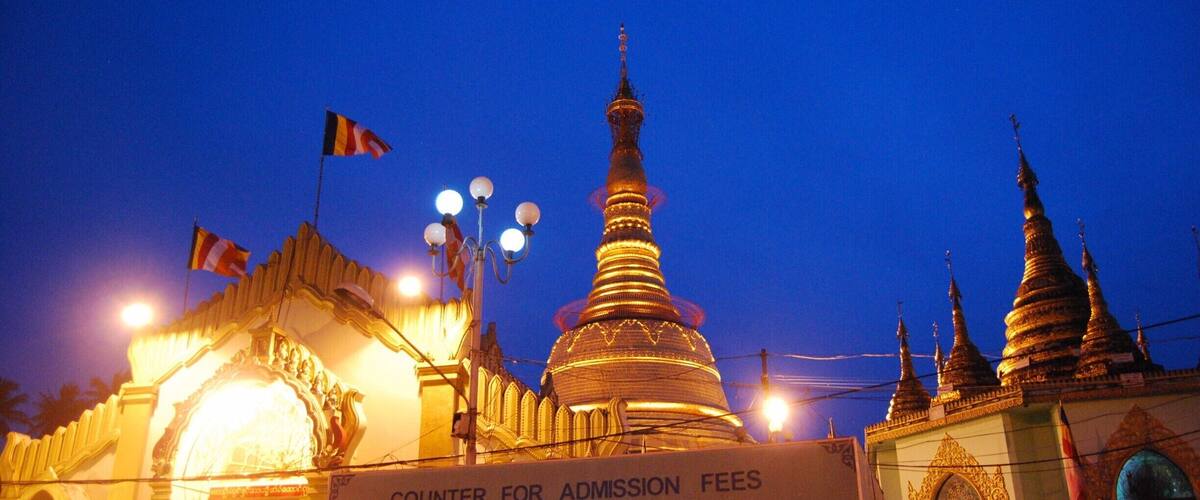 Botahtaung Pagoda as the sun went down. I am not sure what the entrance fee for foreigners is but the huge sign is slightly obnoxious, isn't it?! The Pagoda is very close to some piers which are quite fun to explore. After seeing many other pagodas in the city, we opted out of paying to see another one.