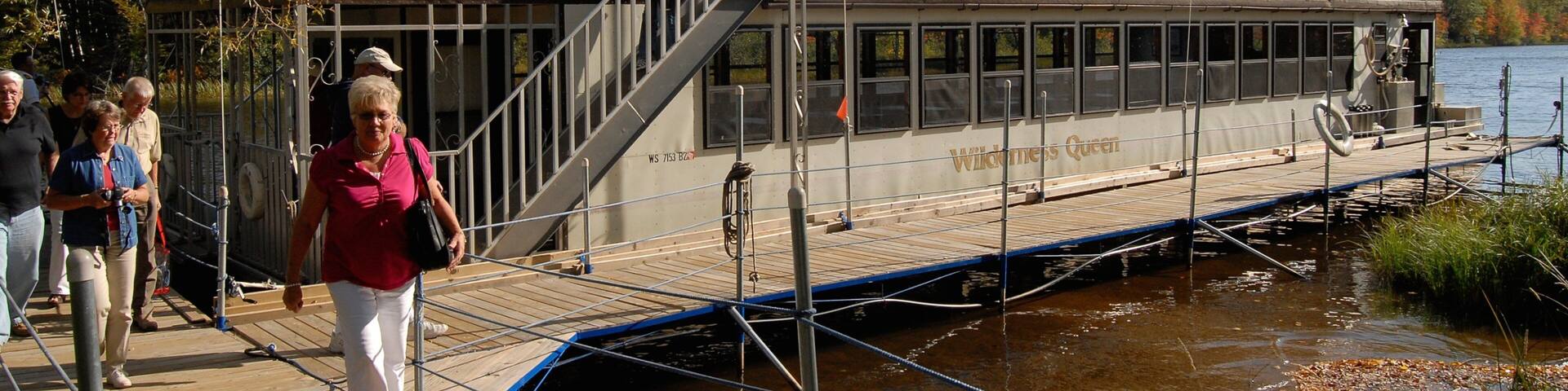 Rhinelander featuring hiking or walking and a lake or waterhole