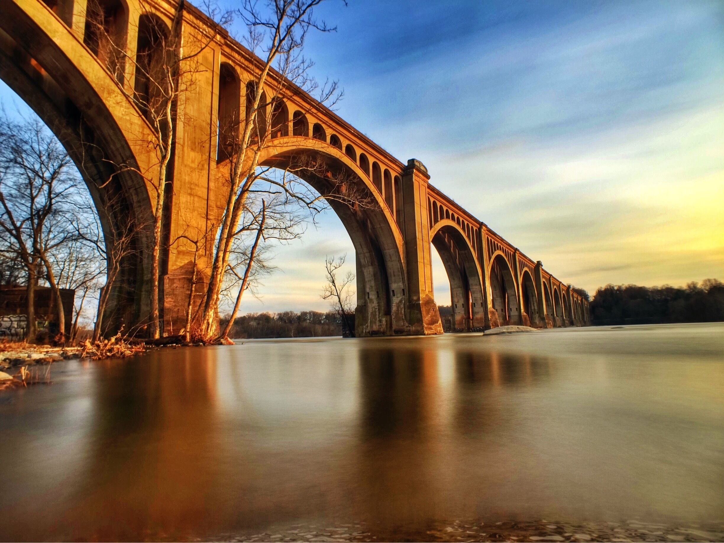 I took this picture of the A-Line Train Bridge near Pump House Park in Richmond, VA. To get here, you have to leave the park and head to the river, crossing over some railroad tracks to do so. Built in 1919, the bridge is still in operation today, carrying trains daily across the James! #architecture