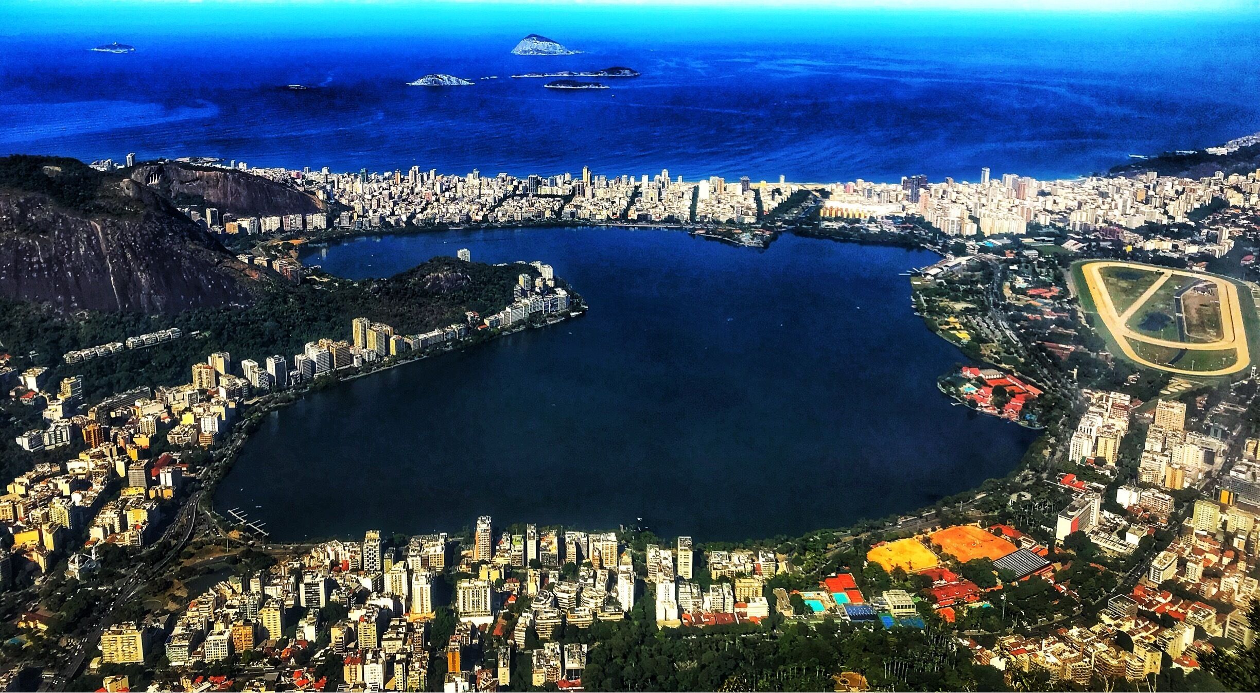 Rodrigo de Freitas Lagoon (Portuguese: Lagoa Rodrigo de Freitas) is a lagoon in the district of Lagoa in the Zona Sul (South Zone) area of Rio de Janeiro. The lagoon is connected to the Atlantic Ocean, allowing sea water to enter by a canal along the edge of a park locally known as Jardim de Alah.