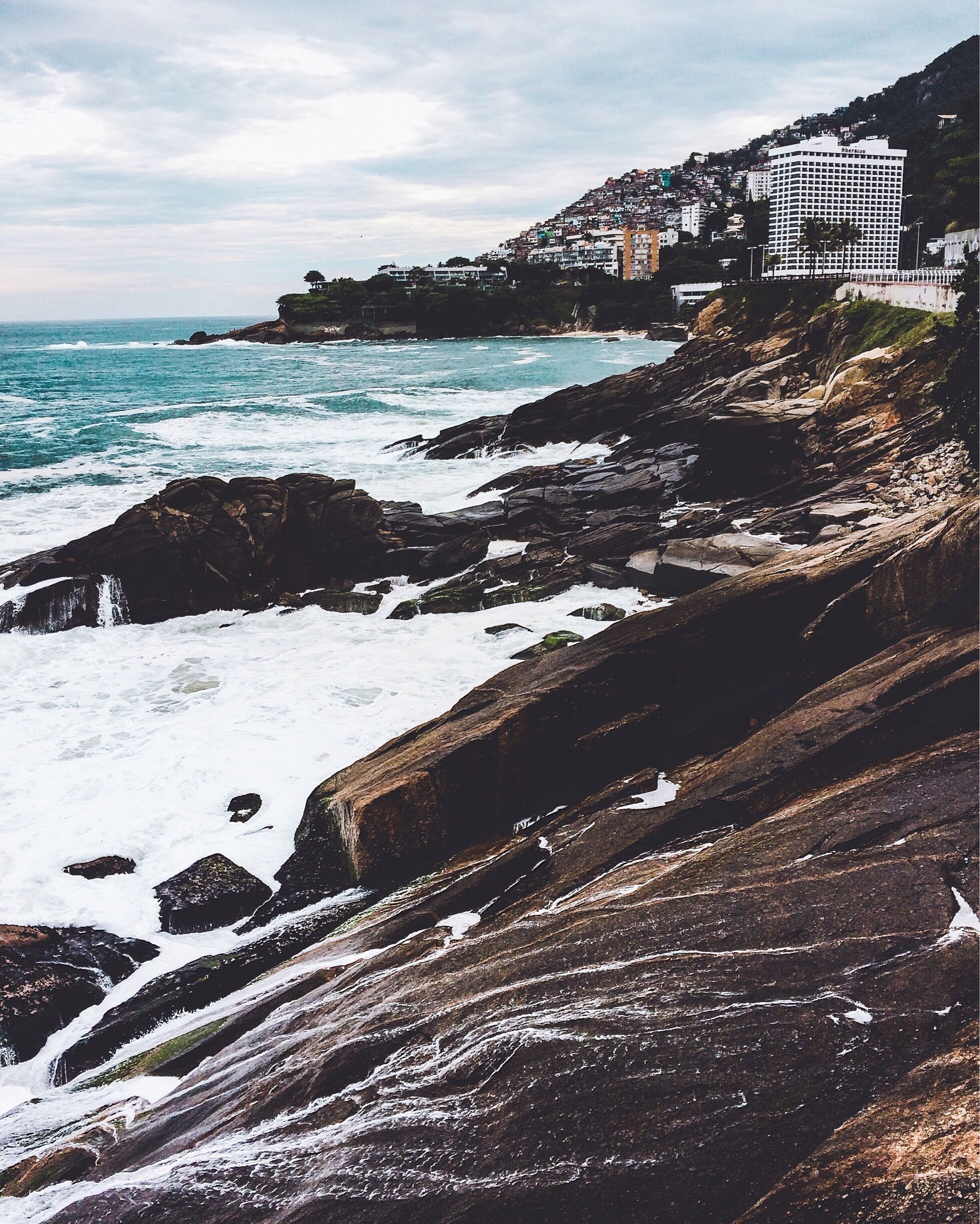 Awesome place, you can see leblon/ipanema beach, and on the other side see this rocked shore and Vidigal favela...