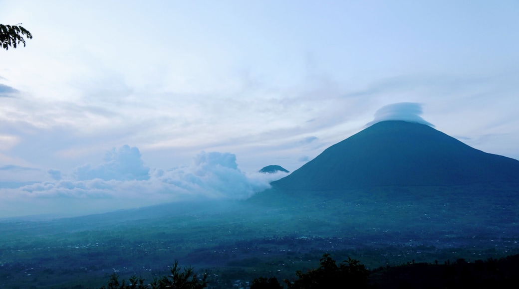 This is near sunset at the beautiful Virunga lodge Rwanda surprised me with its beauty and here at the lodge beauty just strikes you in a way you never forget. The fact that the memories of the lodge are not completely forgotten when compared to the gorilla treks is a testament to how great it is. I blog at circlingthebucketlist if you want to see more pictures of my time here or read about my impressions.