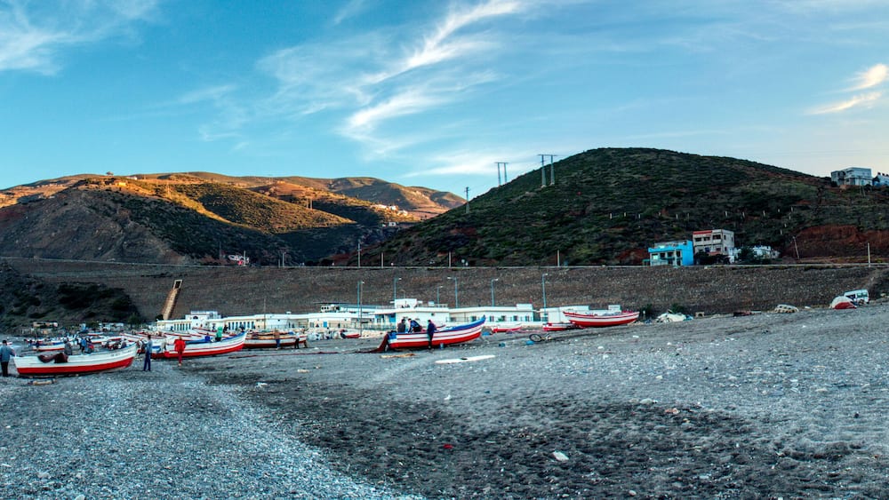 small fishing boats on the beach of Oued Laou, a coastal town in the province of Chefchaouen, Morocco