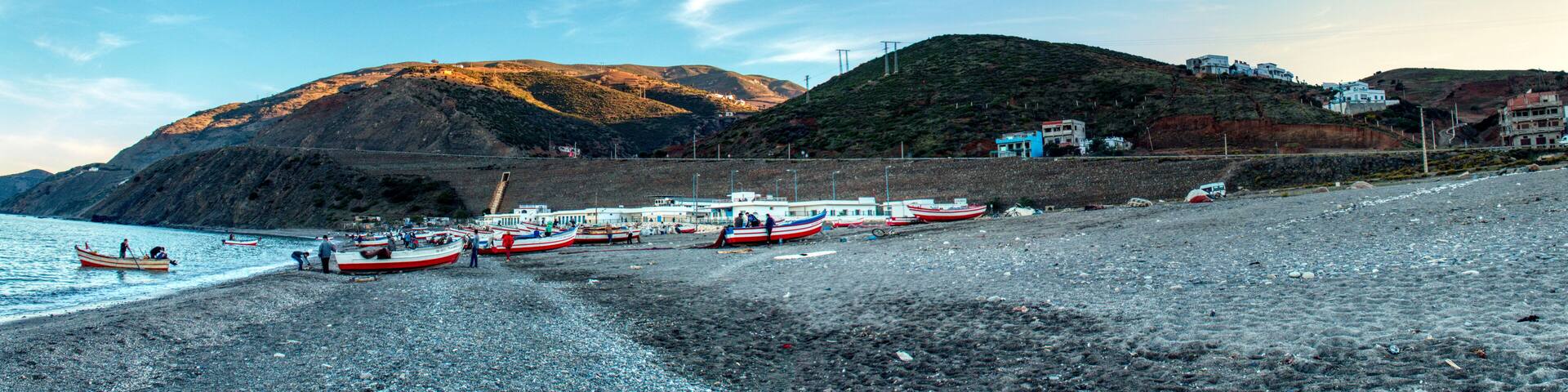 small fishing boats on the beach of Oued Laou, a coastal town in the province of Chefchaouen, Morocco