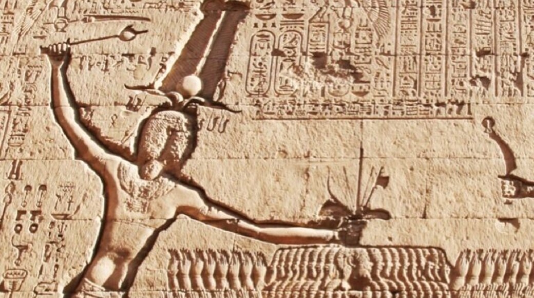 Rameses III smiting his enemies in a single blow. The temple and carvings date from the Greco-Roman period (50-250AD). This is a great temple to visit on a Nile cruise as the hypostyle hall still has it's ceiling. The ruins sit 30ft (9m) below present-day street level in an excavated pit. Despite its impressive size, only the hypostyle hall has been excavated - the entire temple is about four times larger but still lies buried beneath the streets.