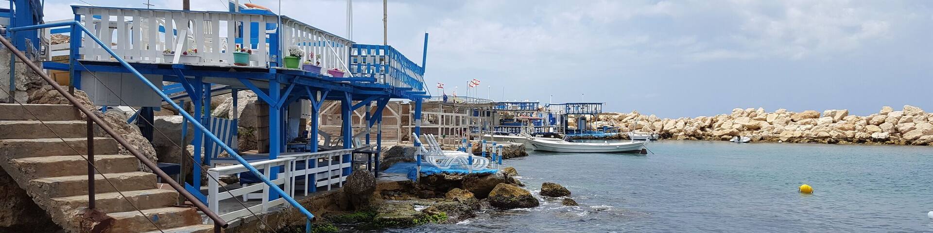 This small village is found on the north of Lebanon. There are a few restaurants here and you can have a dip in the sea for free. It looks like it was cut out of a Greek village, they even a Greek flag on the shore.