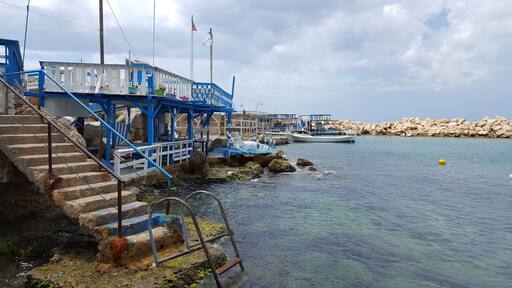 This small village is found on the north of Lebanon. There are a few restaurants here and you can have a dip in the sea for free. It looks like it was cut out of a Greek village, they even a Greek flag on the shore.