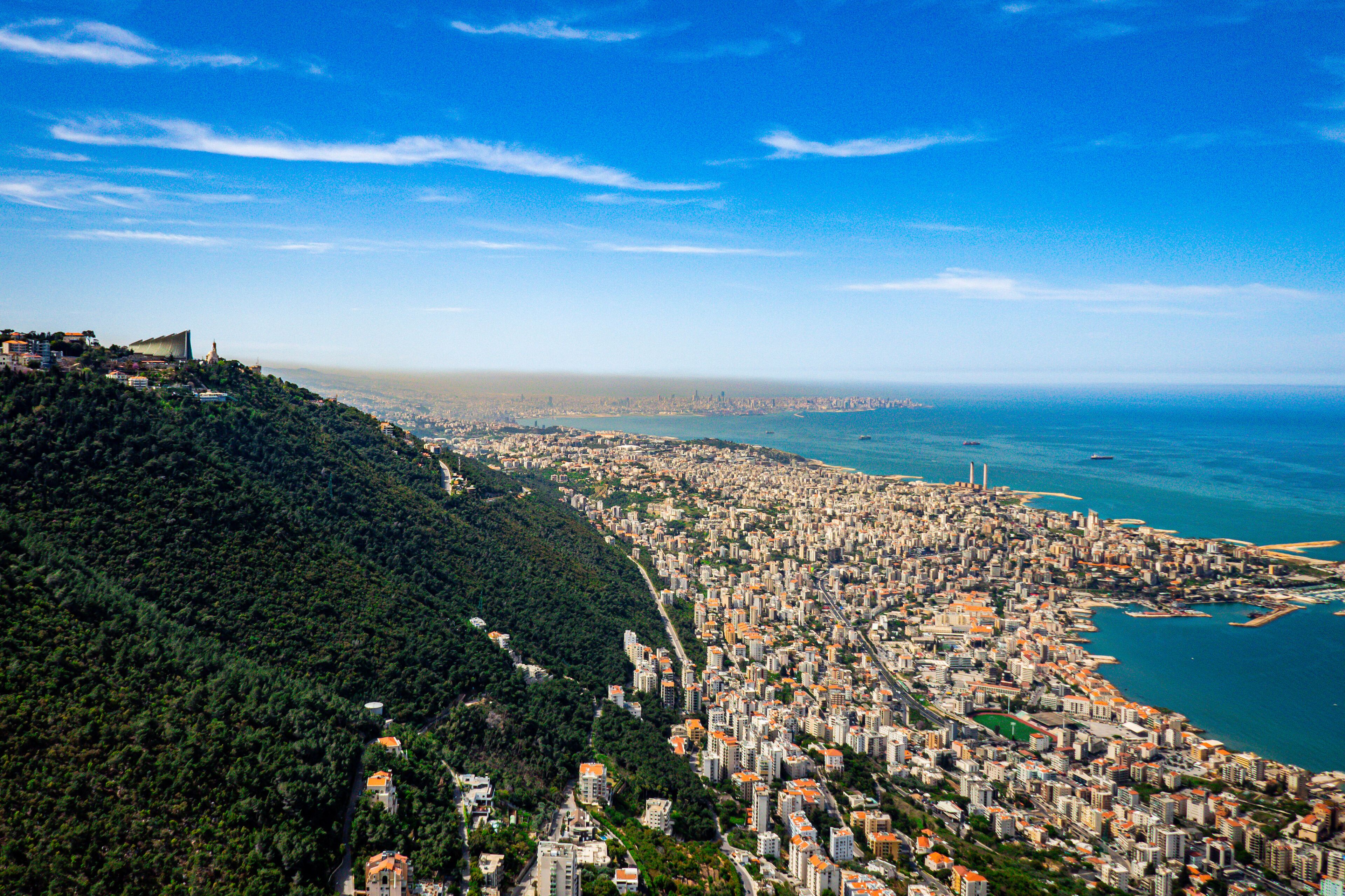 aerial view of the coast of the sea, paragliding over jounieh bay in Lebanon, view of Beirut