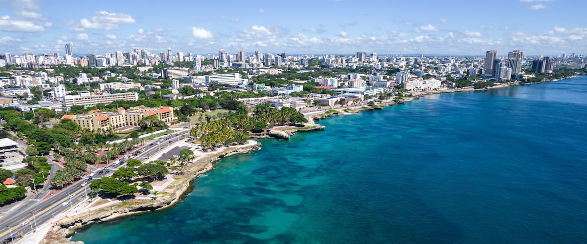 Beautiful aerial view of the city of Santo Domingo - Dominican Republic with is Parks, buildings, suburbs ,turquoise Caribbean ocean, parks and malecon
