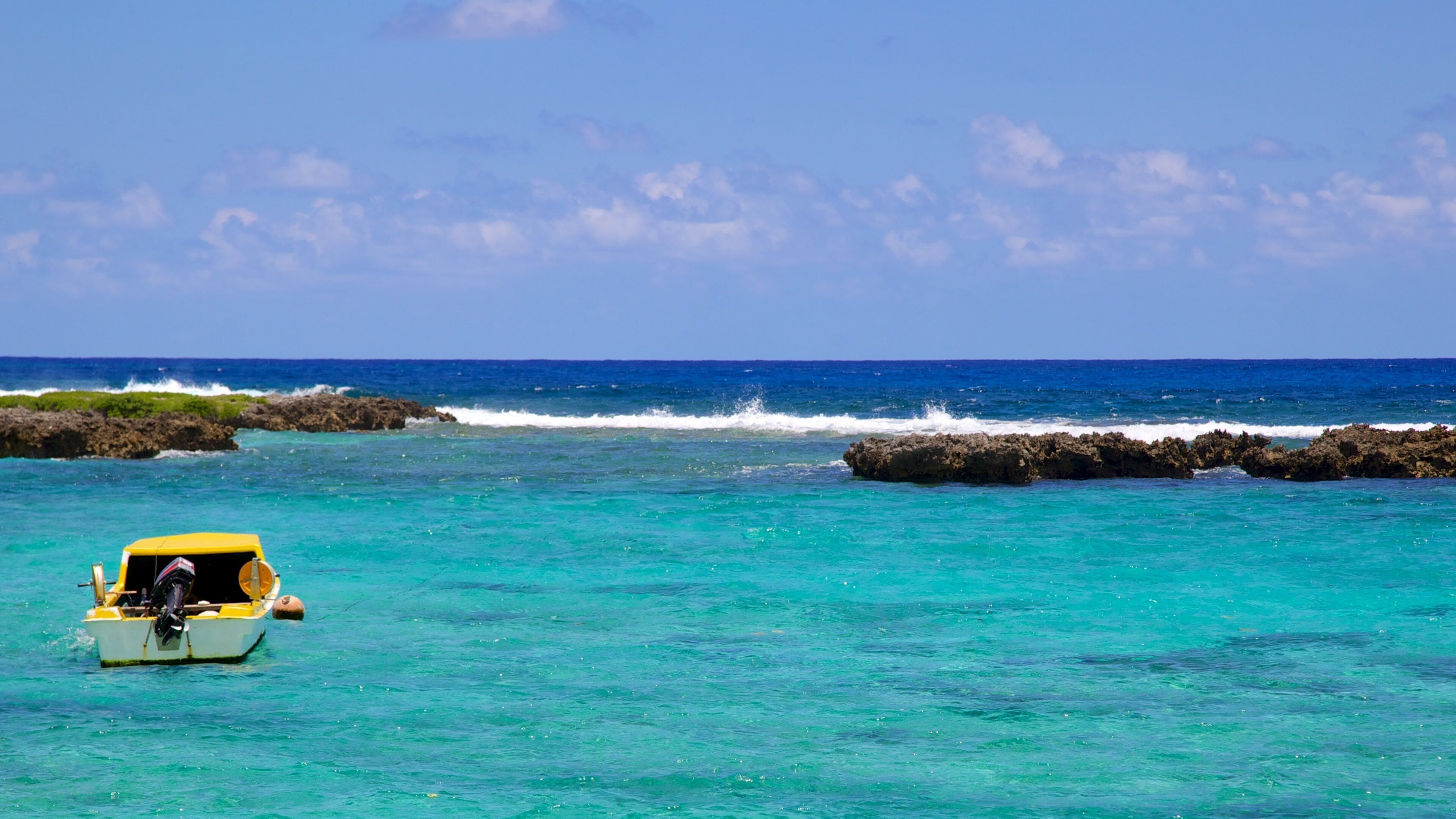 Port Vila featuring boating and rugged coastline
