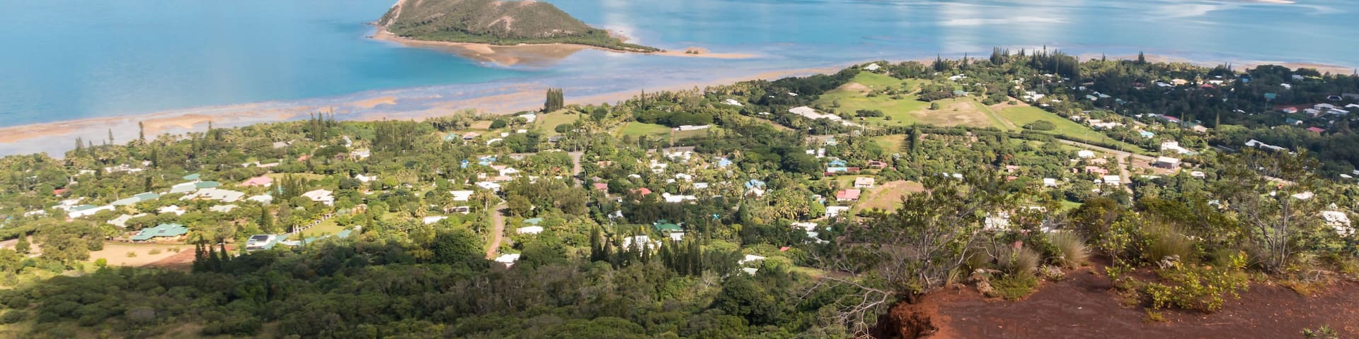 aerial view of New Caledonia coastline with Ilot Charbon and Ile Bailly islands from Mont-Dore mountain
