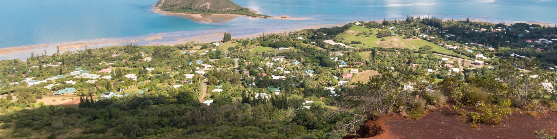 aerial view of New Caledonia coastline with Ilot Charbon and Ile Bailly islands from Mont-Dore mountain