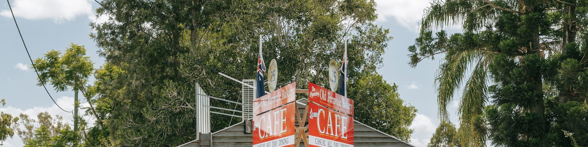 Fernvale showing signage and a small town or village