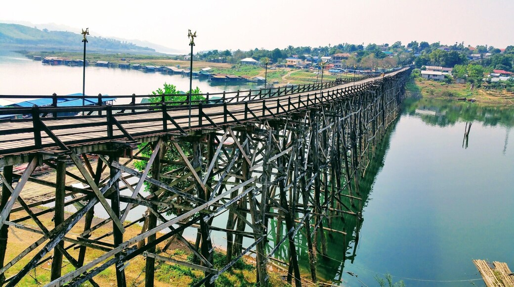 Mon Bridge (Uttama Nusorn Bridge) Sangkhlaburi, Thailand.
The longest wooden bridge in Thailand is this handmade footbridge spanning over 400m long in the rural but lovely town of Sangkhlaburi. #packsandaplan #patterns
Check out our other adventures and useful information http://packsandaplan.com/