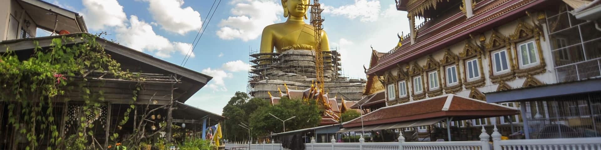 The construction site of the Big golden buddha statue at Wat Paknam temple nearby Phasi charoen canal in Bangkok Thailand