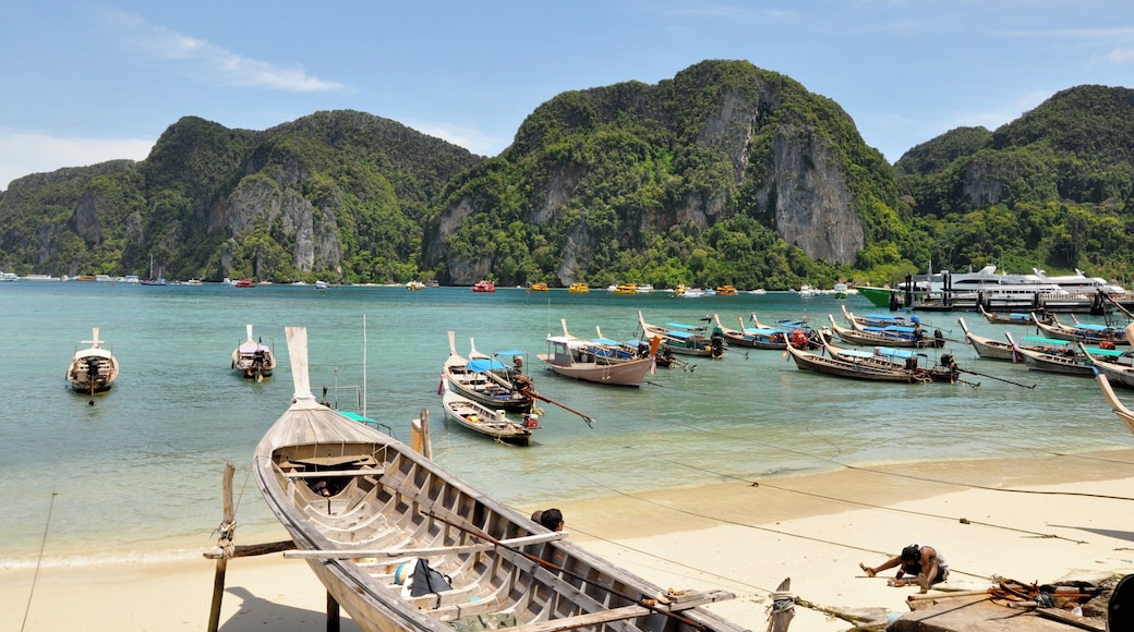 Love how the colors on the fishing boats pop against the watery background, and the fishing boats juxtaposed anachronistically against the yacht. #LifeatExpedia