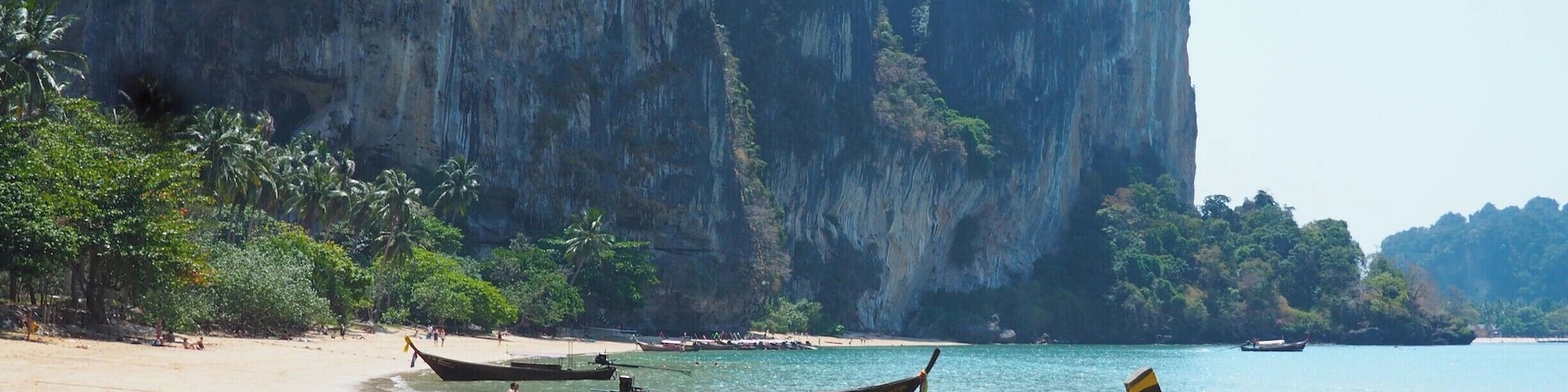 A 20 minute clamber up and over rocks (rope-assisted) from Railay West beach will take you to this gem. Quieter than the other beaches around Railay, and with coarser sand, it's nevertheless well worth making the effort. 
Read more at
http://www.aboveusonlyskies.com/reflections-on-railay/