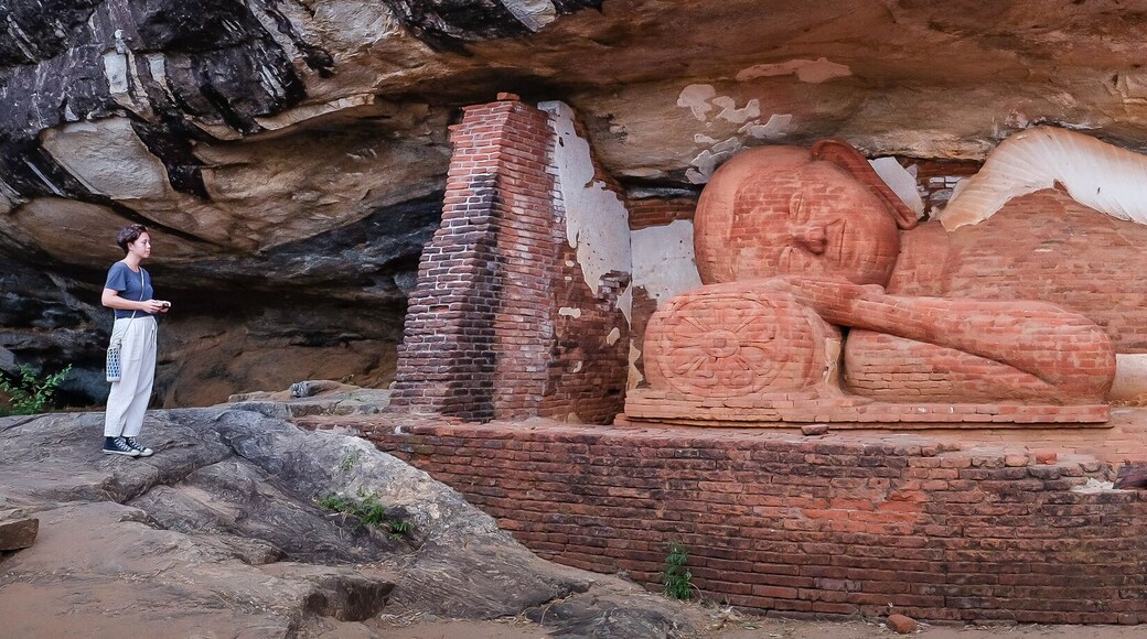 Sleeping Buddhism statue at the Pidurangala mountain. Sigiriya Sri Lanka.